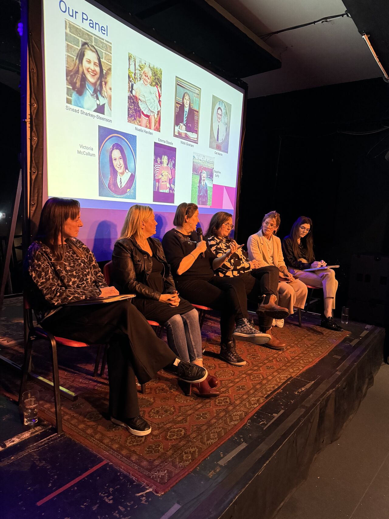 A women in tech panel discussion on stage